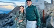 Syed Saddiq Lamar Bella di Puncak Gunung Kinabalu Semasa Hujan Lebat