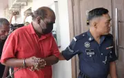 Pasangan Kubur Cina Dibebaskan Mahkamah Tinggi Pulau Pinang Selepas Hukuman Dikurangkan