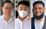 Mahkamah perintah Papagomo bayar RM280,000 kepada Guan Eng, anak