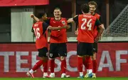Austria bangkit dari kad merah awal untuk kalahkan Tunisia