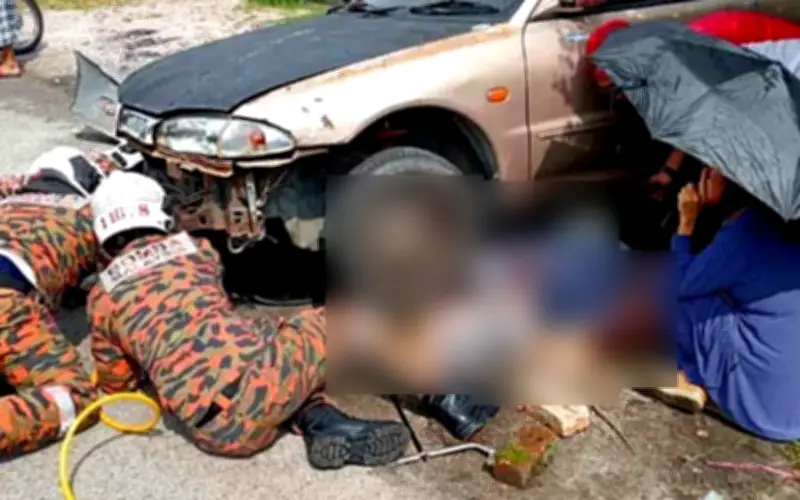 Wanita cedera kaki tersepit di bawah kereta ketika buka pagar rumah